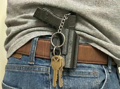 The QuickDraw Keychain - Mini Pistol & Holster